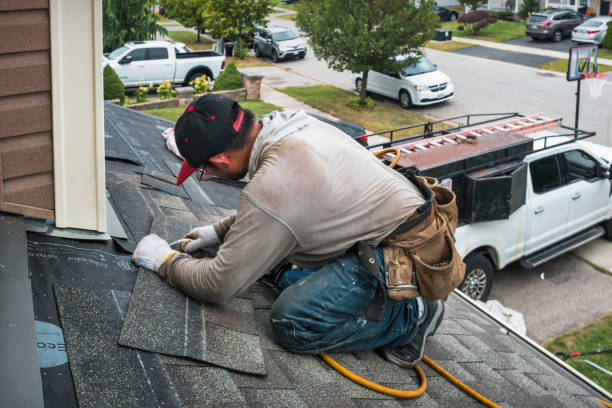 Professional Roofing technician working in Thompsonville, CT